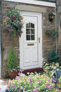 White entrance door plants