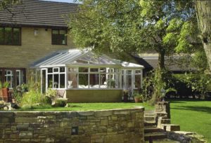 gable fronted conservatory stone wall garden