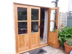 panelled oak bi-fold doors