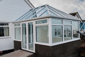 white conservatory with french doors