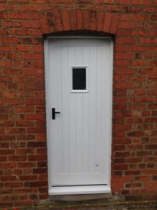 Tongue and groove panelled door in white cheshire joinery services