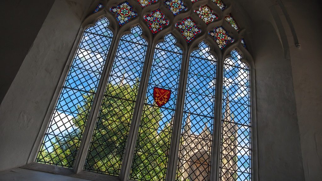 leaded window with stained glass insets in Becket Chapel, Peterborough Cathedral